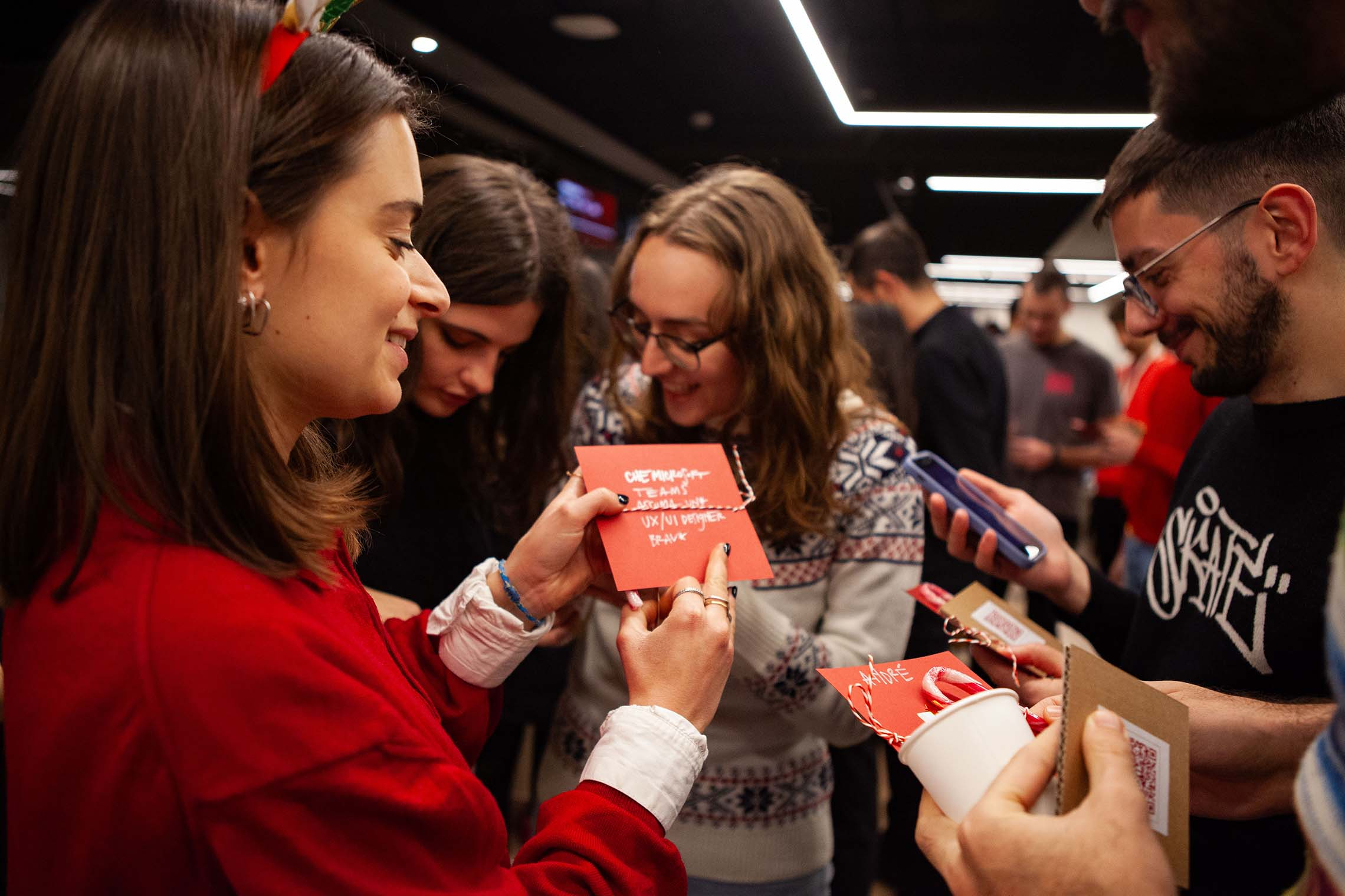 TVA team exchanging Christmas presents 