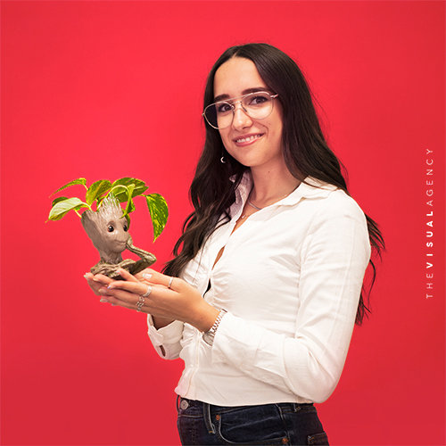 Beatrice Bazzan is a Digital Designer. She is holding a plant inside the Groot head, cultivating ideas with a fantasy vibe.