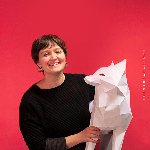 Benedetta Signaroldi is the Senior Art Director. She's hugging a paper fox as if it were her spirit animal.